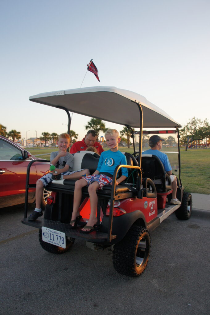 Golf cart with kids | Port Aransas Explorer