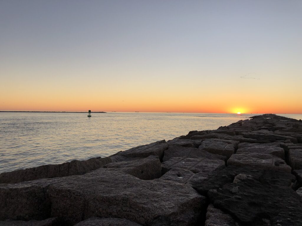 sunrise over the jetty | Port Aransas Explorer