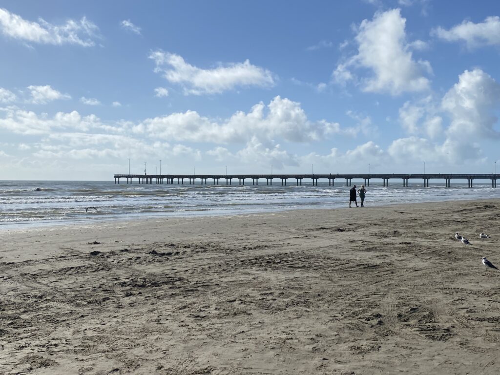 Beach view of Horace Caldwell Pier | Port Aransas Explorer @portaransastex